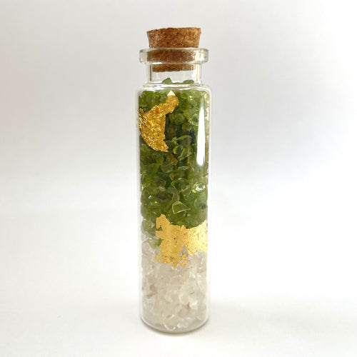 PERIDOT - CLEAR QUARTZ WITH GOLD IN BOTTLE